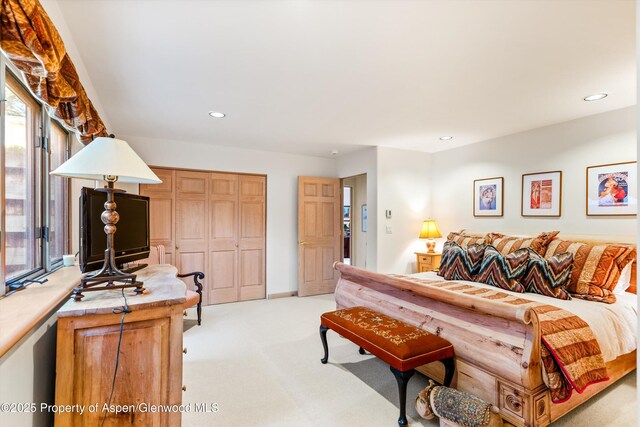 333 W Hopkins Ave, Aspen, CO 81611 - bedroom with recessed lighting, a closet, and light colored carpet