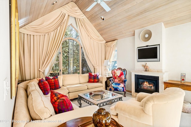 333 W Hopkins Ave, Aspen, CO 81611 - living area with a glass covered fireplace, lofted ceiling, wood ceiling, and ceiling fan