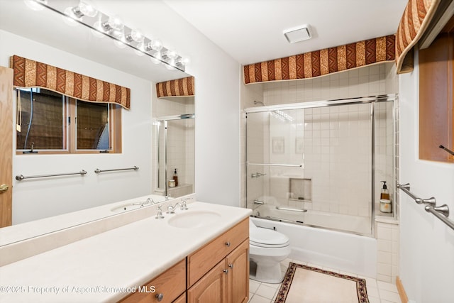 333 W Hopkins Ave, Aspen, CO 81611 - bathroom featuring tile patterned flooring, vanity, enclosed tub / shower combo, and toilet