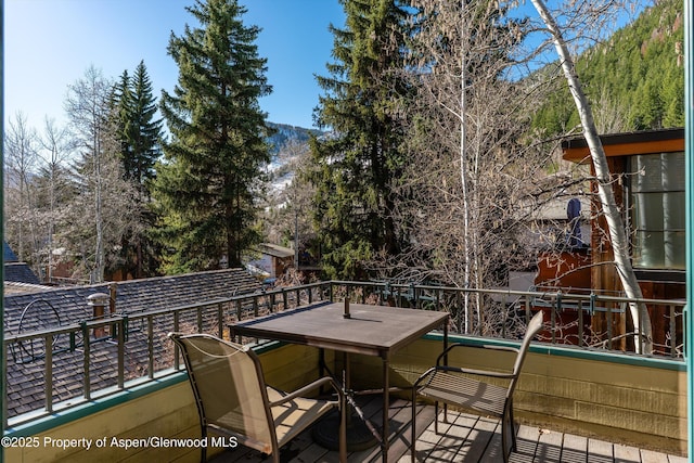 333 W Hopkins Ave, Aspen, CO 81611 - wooden deck with outdoor dining area
