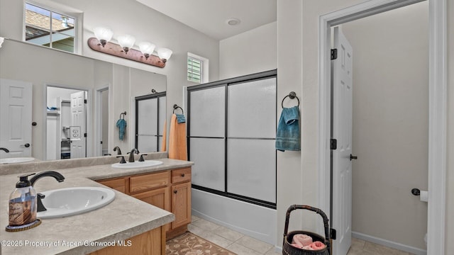 150 Castle Ct, New Castle, CO 81647 - full bathroom with double vanity, enclosed tub / shower combo, and tile patterned flooring