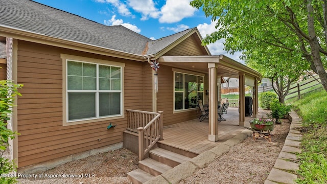 150 Castle Ct, New Castle, CO 81647 - entrance to property featuring a wooden deck and a shingled roof