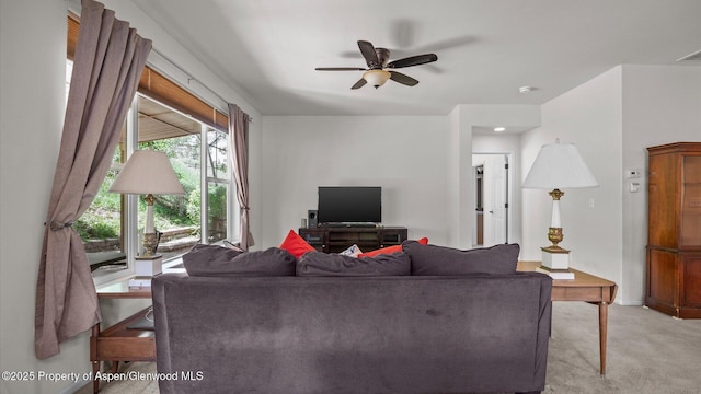 150 Castle Ct, New Castle, CO 81647 - living area with light carpet and ceiling fan