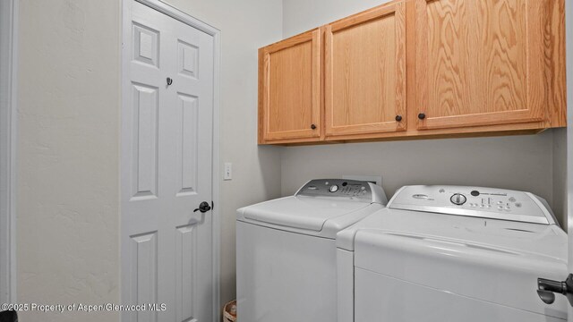 150 Castle Ct, New Castle, CO 81647 - washroom with cabinet space and independent washer and dryer