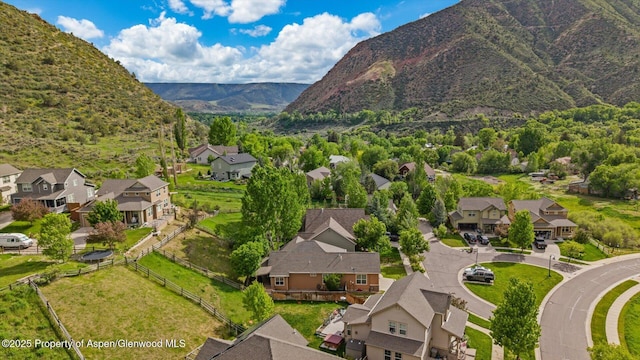 150 Castle Ct, New Castle, CO 81647 - aerial view of residential area featuring a mountainous background