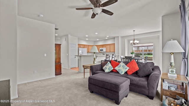 150 Castle Ct, New Castle, CO 81647 - living area featuring ceiling fan, light colored carpet, a chandelier, and recessed lighting