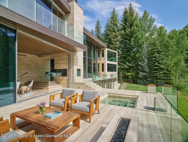 102 Wood Duck Ln, Aspen, CO 81611 - wooden deck with an in-ground hot tub and a yard