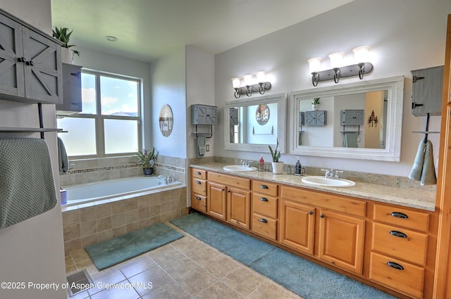 369 N Meadow Dr, Rifle, CO 81650 - full bathroom with double vanity, a garden tub, and tile patterned floors