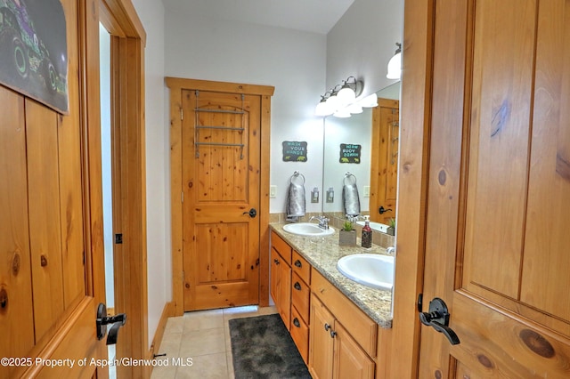 369 N Meadow Dr, Rifle, CO 81650 - full bathroom with double vanity and tile patterned floors