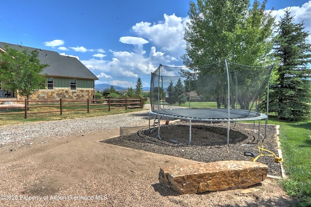 369 N Meadow Dr, Rifle, CO 81650 - view of yard featuring a trampoline