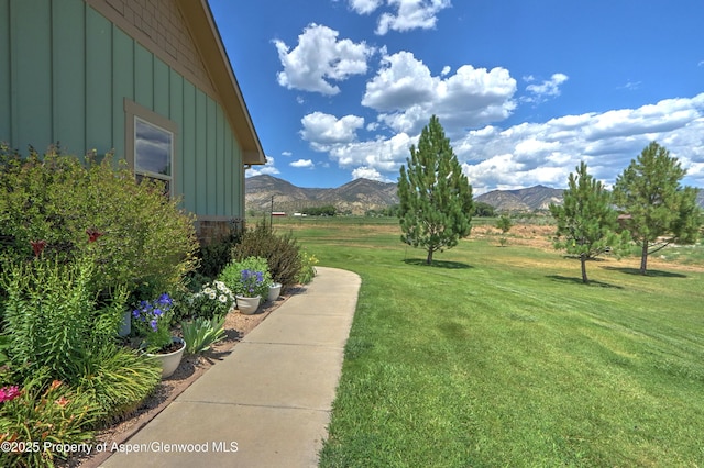 369 N Meadow Dr, Rifle, CO 81650 - view of green lawn featuring a mountain view
