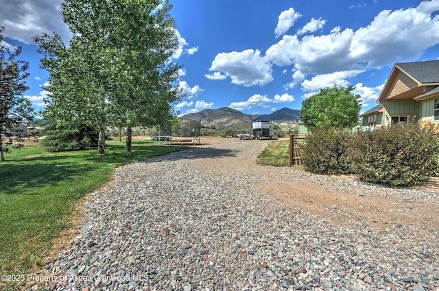 369 N Meadow Dr, Rifle, CO 81650 - view of dirt / gravel road featuring a mountain view