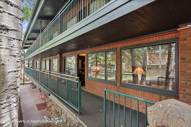 exterior space featuring a balcony