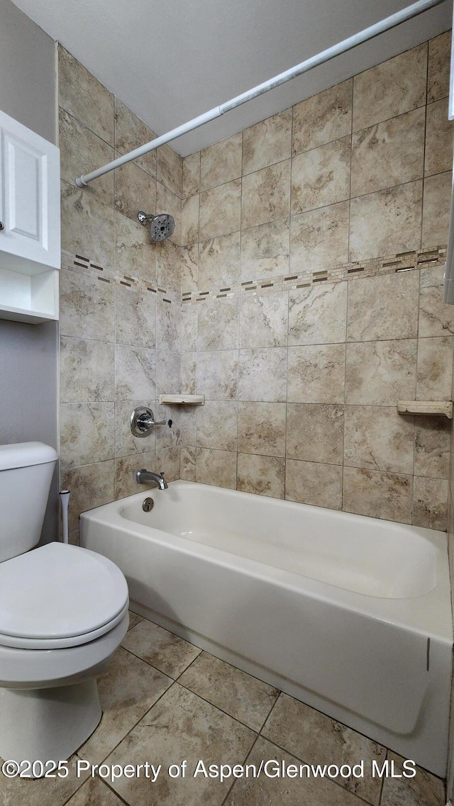 3863 W 6th St, Craig, CO 81625 - full bathroom with toilet, shower / bathtub combination, and tile patterned floors