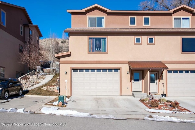 front of property featuring a garage