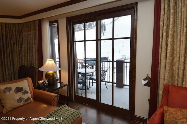 doorway to outside with french doors, dark hardwood / wood-style floors, and crown molding