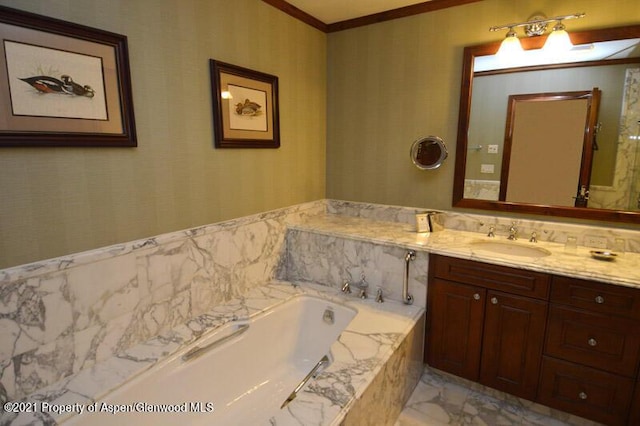 bathroom featuring vanity and tiled bath