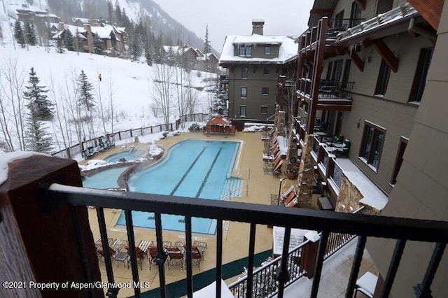 view of snow covered pool