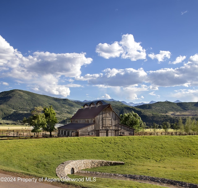 property view of mountains featuring a rural view