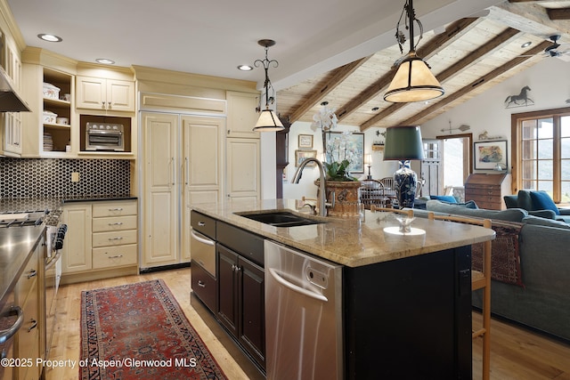 47 Mule Deer Run, Snowmass, CO 81654 - kitchen with appliances with stainless steel finishes, open floor plan, open shelves, cream cabinets, and recessed lighting