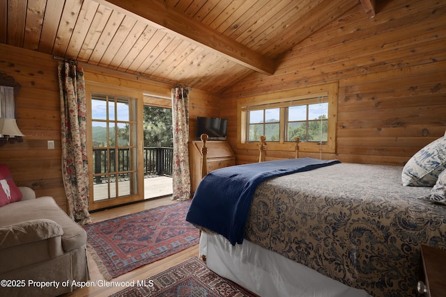 47 Mule Deer Run, Snowmass, CO 81654 - bedroom featuring wooden walls, wood ceiling, access to exterior, and wood finished floors