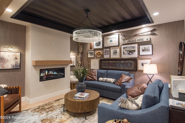 300 Carriage Way Unit 614, Snowmass Village, CO 81615 - living area with a glass covered fireplace, wood finished floors, recessed lighting, and baseboards
