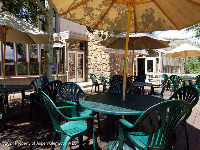 300 Carriage Way Unit 614, Snowmass Village, CO 81615 - view of patio / terrace featuring outdoor dining area and french doors