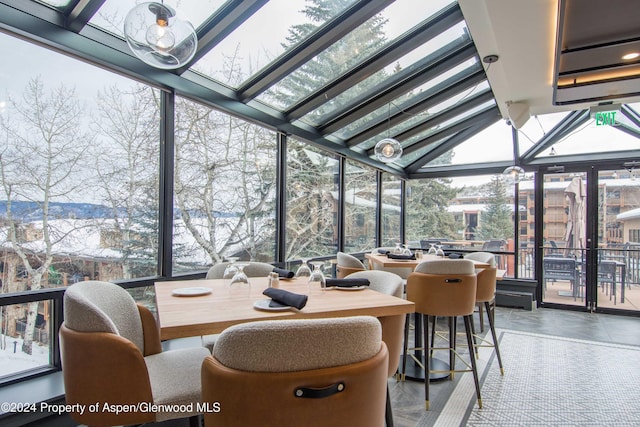 300 Carriage Way Unit 614, Snowmass Village, CO 81615 - sunroom featuring outdoor dining space, vaulted ceiling, and a mountain view
