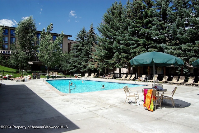 300 Carriage Way Unit 614, Snowmass Village, CO 81615 - community pool with fence and a patio