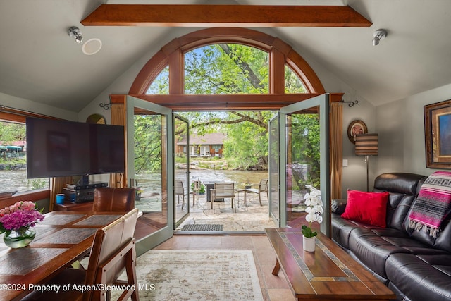living room with lofted ceiling