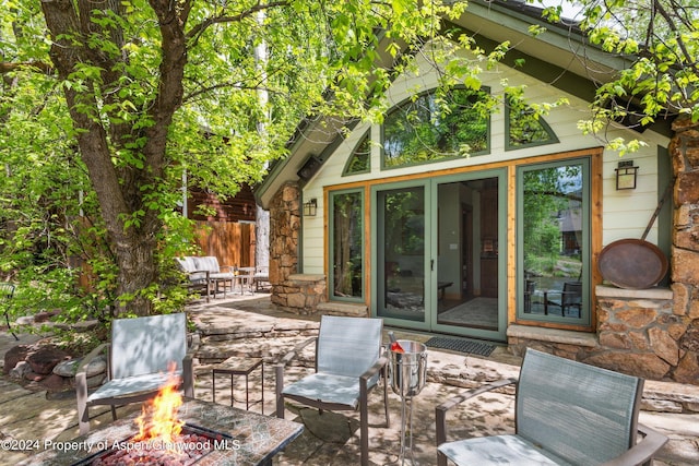 view of patio featuring a fire pit