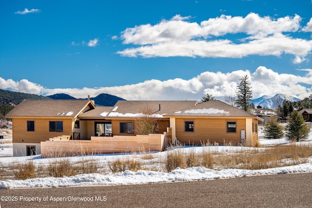 view of front of home with a mountain view