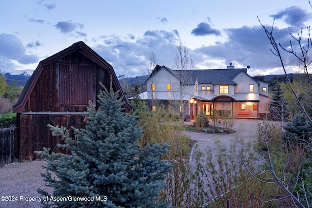 view of front of home with a mountain view