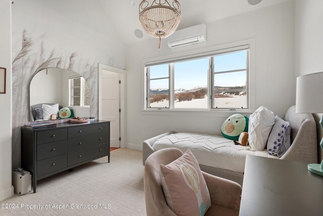 bedroom with lofted ceiling, light colored carpet, and an AC wall unit