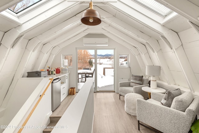 sunroom / solarium with lofted ceiling with skylight and a wall mounted AC