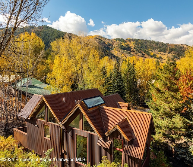 mountain view featuring a wooded view