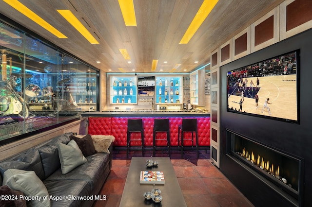 bar featuring a community bar, tile patterned floors, recessed lighting, and wooden ceiling