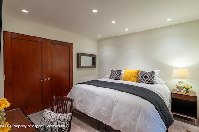 bedroom featuring recessed lighting