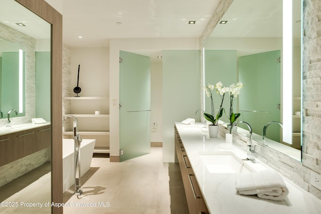 126 Juan St, Aspen, CO 81611 - full bath featuring vanity and a soaking tub