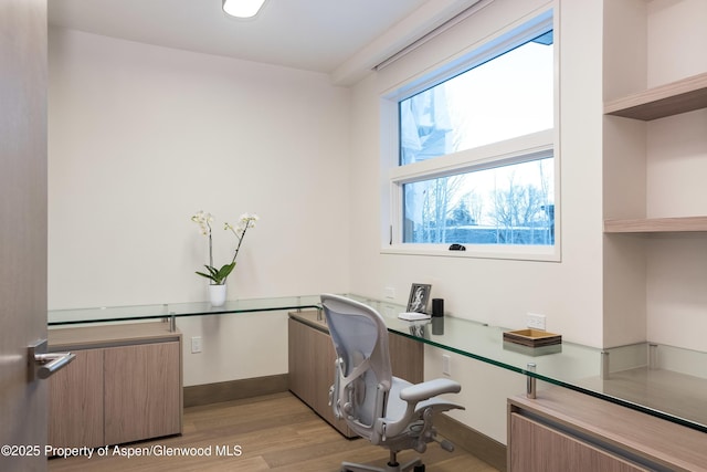 126 Juan St, Aspen, CO 81611 - home office featuring light wood finished floors and baseboards