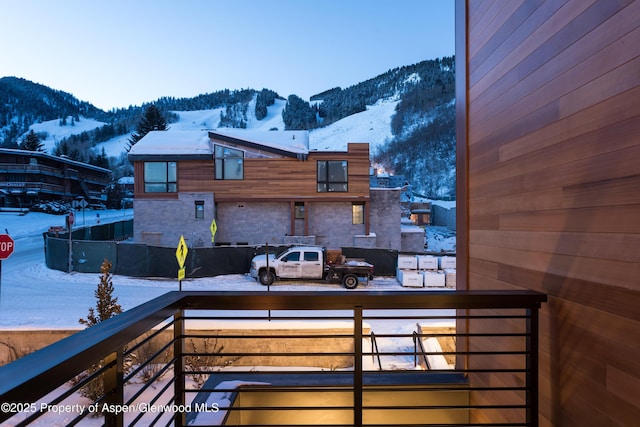 126 Juan St, Aspen, CO 81611 - snow covered back of property featuring a mountain view