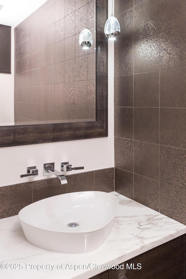 126 Juan St, Aspen, CO 81611 - bathroom with vanity and tile walls