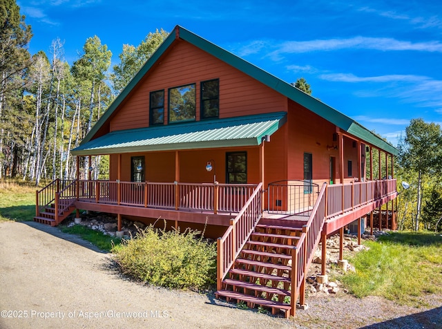 180 Ridge Rd, Gunnison, CO 81230 - rustic home with covered porch and stairway