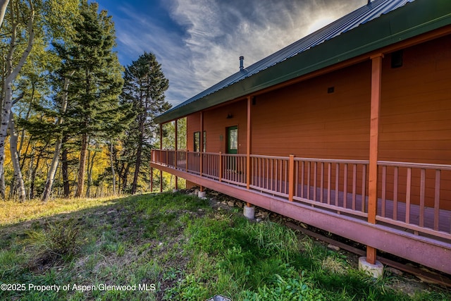 180 Ridge Rd, Gunnison, CO 81230 - view of home's exterior with a deck and metal roof