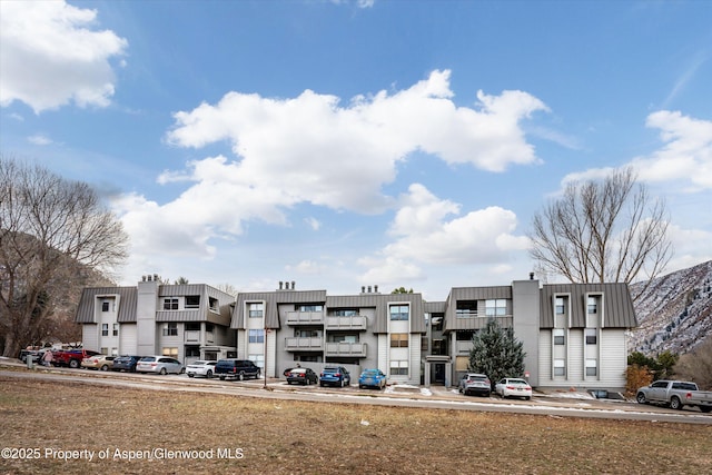 1527 Blake Ave Unit 209, Glenwood Springs, CO 81602 - view of property featuring uncovered parking