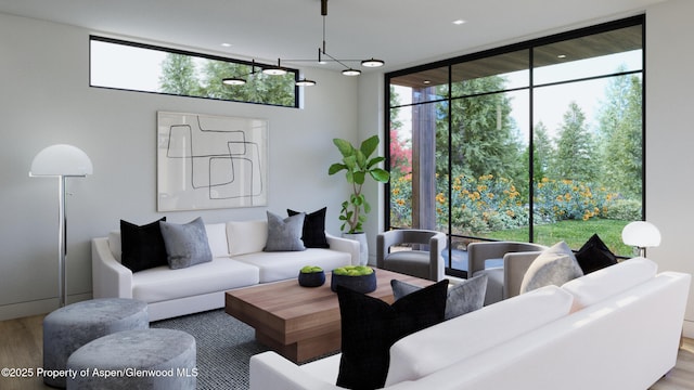 living room featuring wood finished floors and floor to ceiling windows