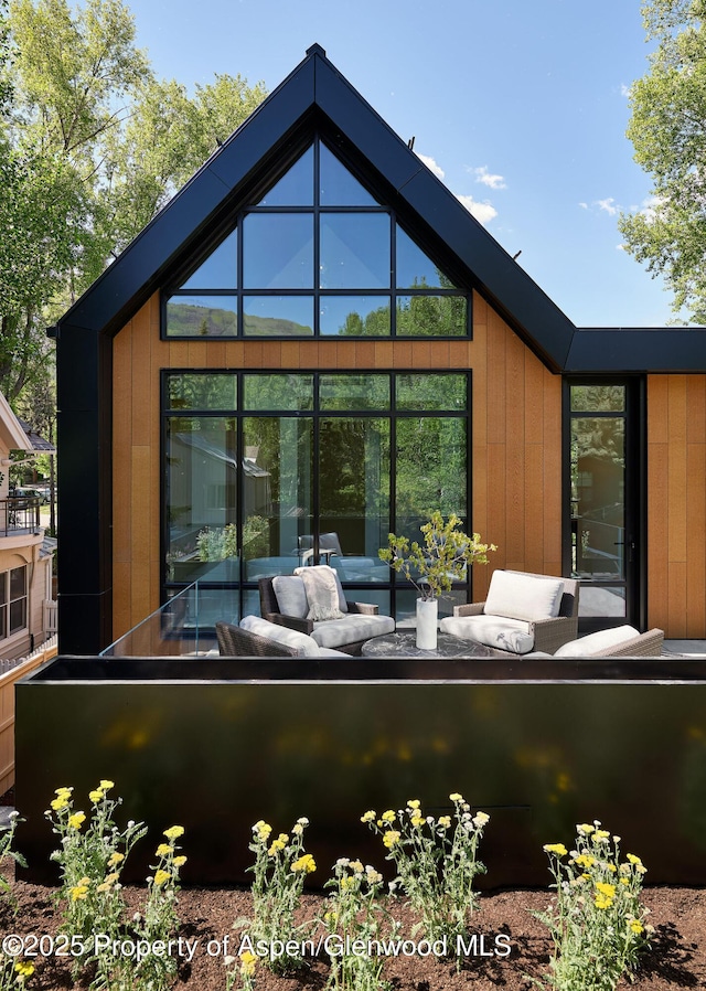 810 W Smuggler St, Aspen, CO 81611 - rear view of property featuring an outdoor hangout area