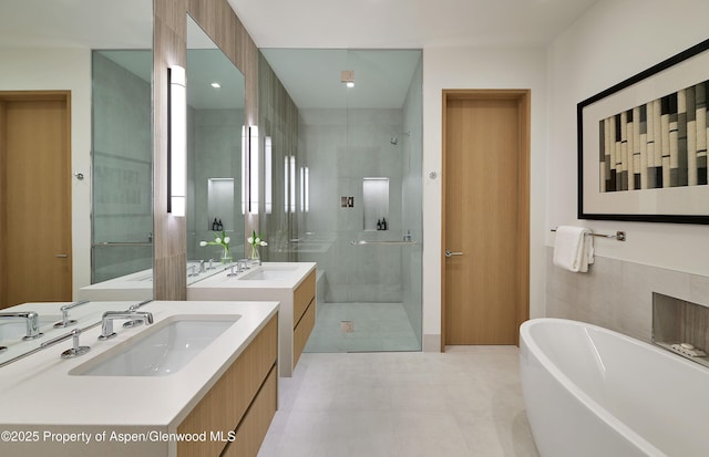 810 W Smuggler St, Aspen, CO 81611 - bathroom featuring a shower stall, a freestanding bath, and vanity