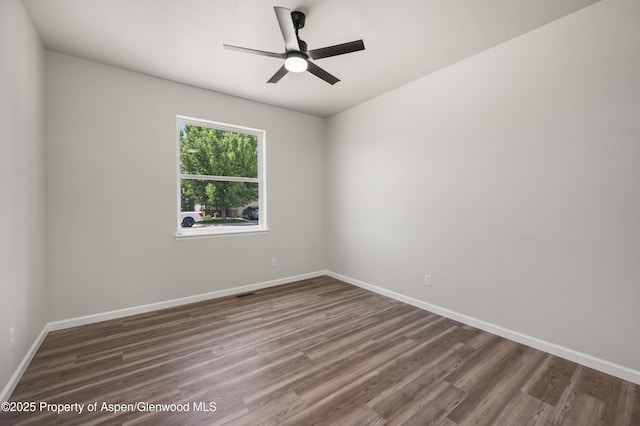 964 E 17th St, Rifle, CO 81650 - unfurnished room with a ceiling fan, wood finished floors, and baseboards
