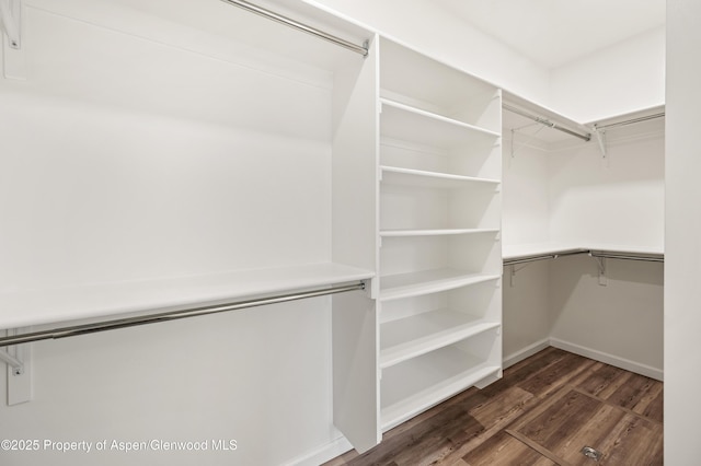 964 E 17th St, Rifle, CO 81650 - walk in closet featuring dark wood finished floors
